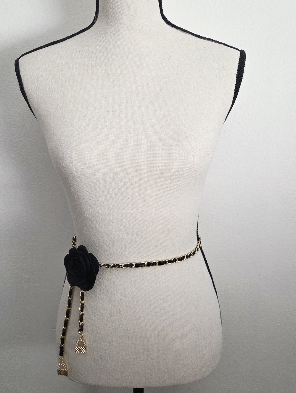 Gold and black chain belt with flower decor